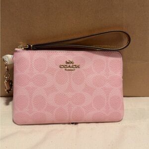 Powder Pink Signature Canvas Wristlet